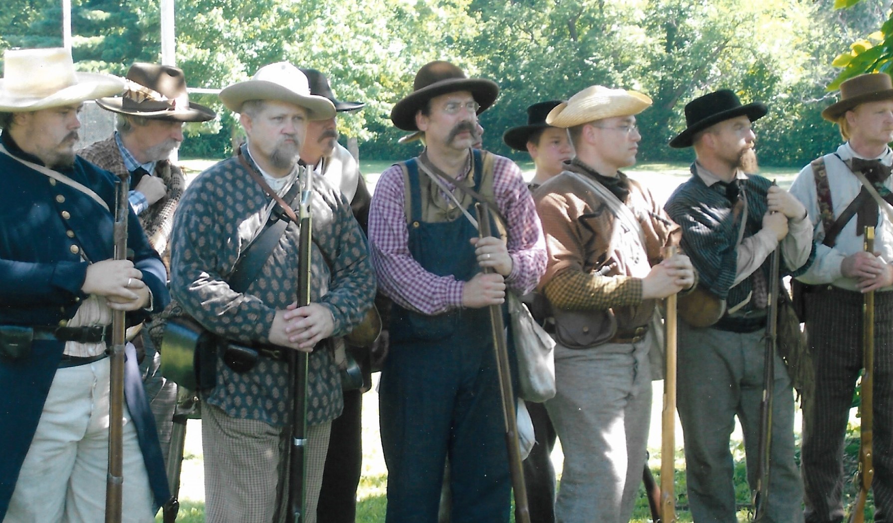 men dressed in civil war attire